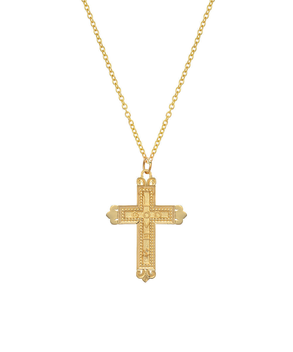 The 14 Karat Yellow Gold Fleur Cross Pendant Necklace, 18", features an intricately detailed yellow gold cross with decorative edges on a stylish Italian rolo chain.