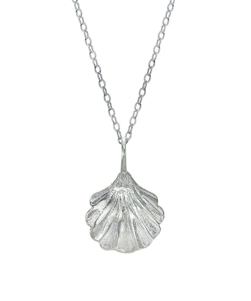 The Sterling Silver Flat Scallop Seashell Pendant Necklace features a sleek scallop shell pendant displayed on a white background, offering an elegant ocean-inspired accessory that captures the timeless beauty of the sea.