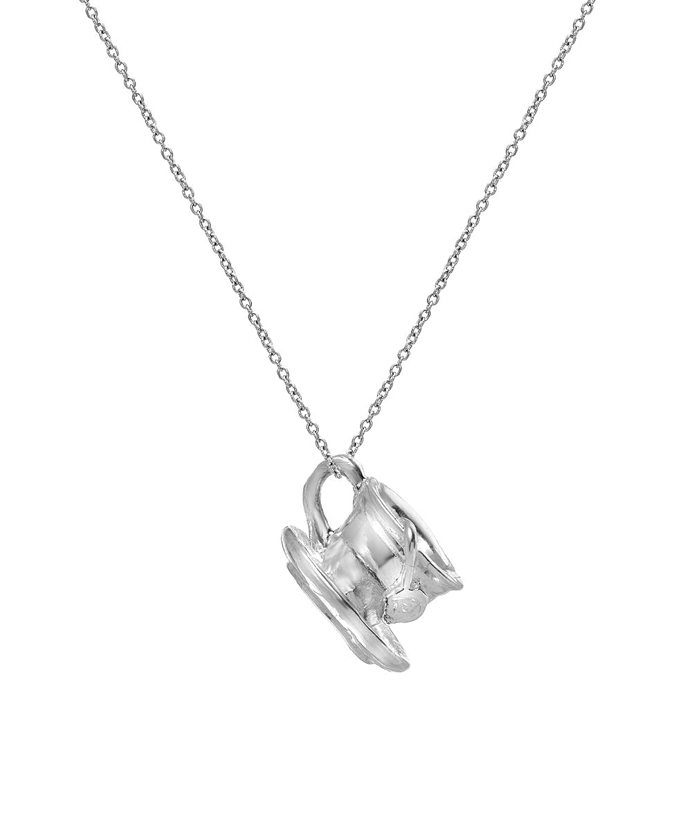 The Sterling Silver Tea Cup Pendant Necklace features a charming teacup and saucer on a fine 925 silver chain, beautifully displayed against a white background—perfect for tea lovers.