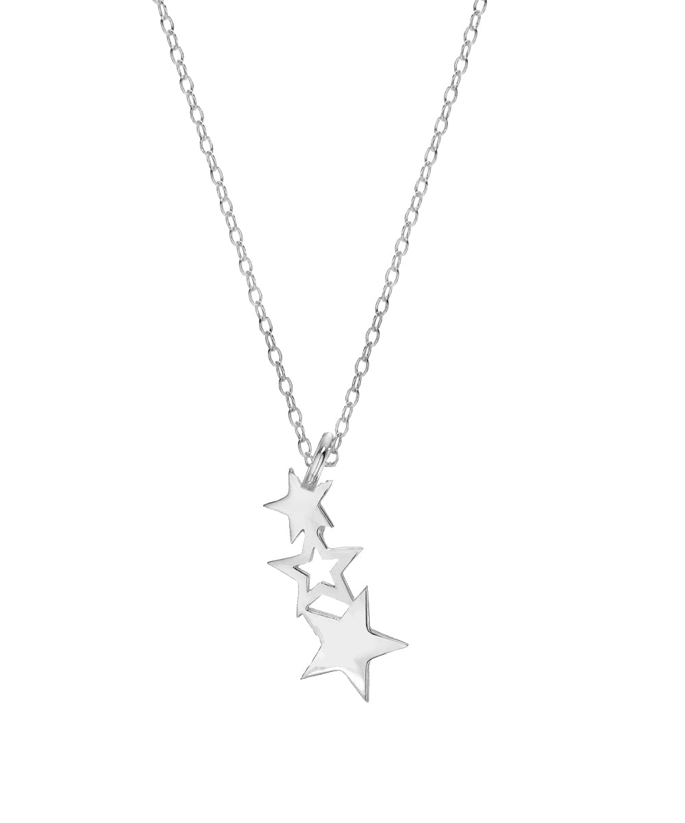 The Sterling Silver North Star Pendant Necklace features three star-shaped pendants of different sizes clustered on a delicate chain, creating a celestial jewelry piece that shines beautifully against a white background.