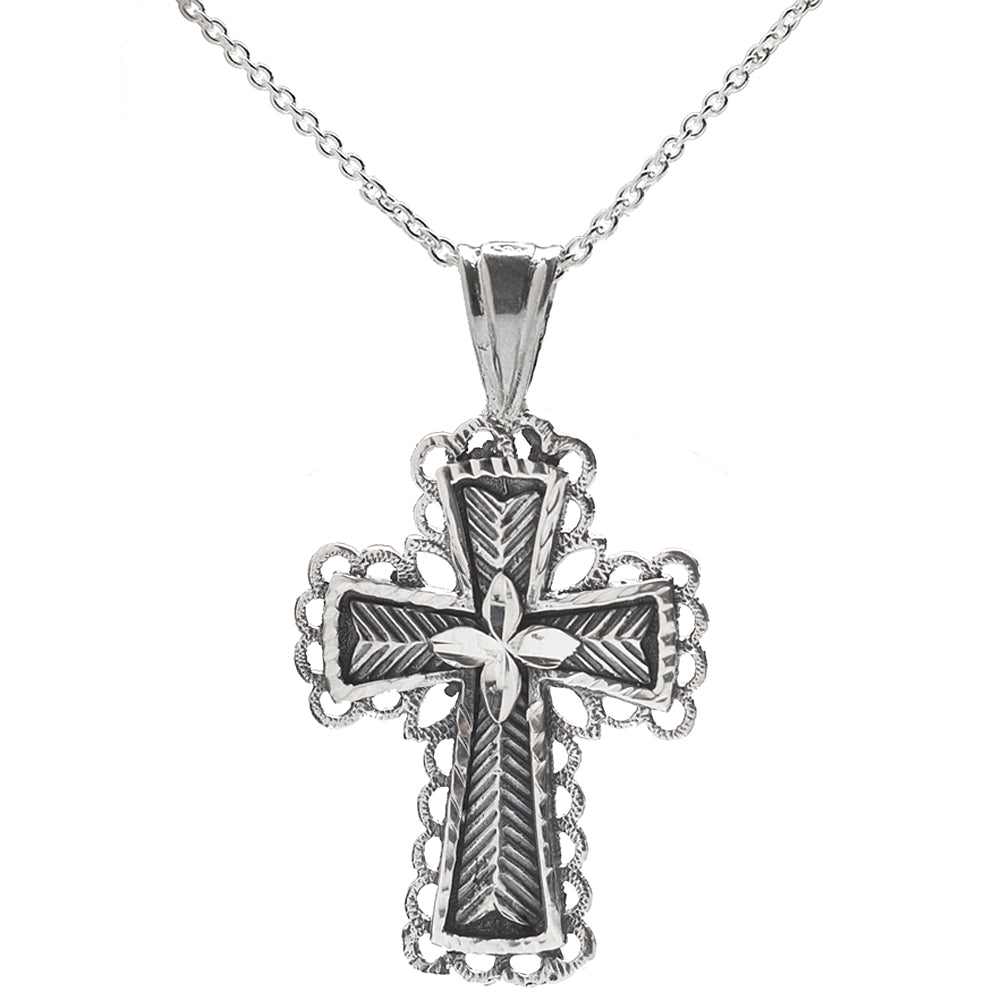 The Sterling Silver Cross Pendant Necklace features a 925 sterling silver cross with intricate etched patterns, scalloped edges, and a raised floral or star design at the center on a delicate chain.