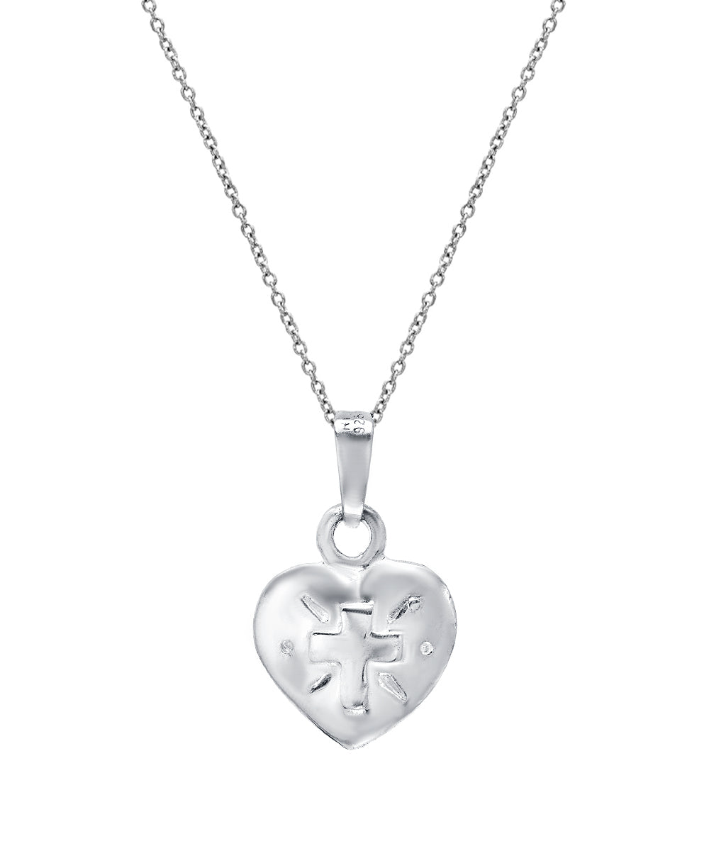 The Sterling Silver Faith and Cross on Puff Heart Reversible Pendant Necklace features a delicate chain with a heart-shaped pendant, showcasing faith and cross designs—perfect as spiritual jewelry.
