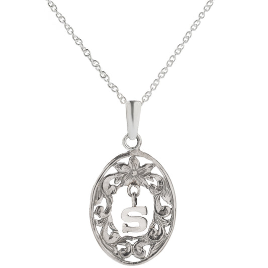 The Sterling Silver Floral Initial Customizable Personalized Pendant Necklace features an oval-shaped pendant with a floral design and customizable initial, elegantly hanging from a delicate chain.