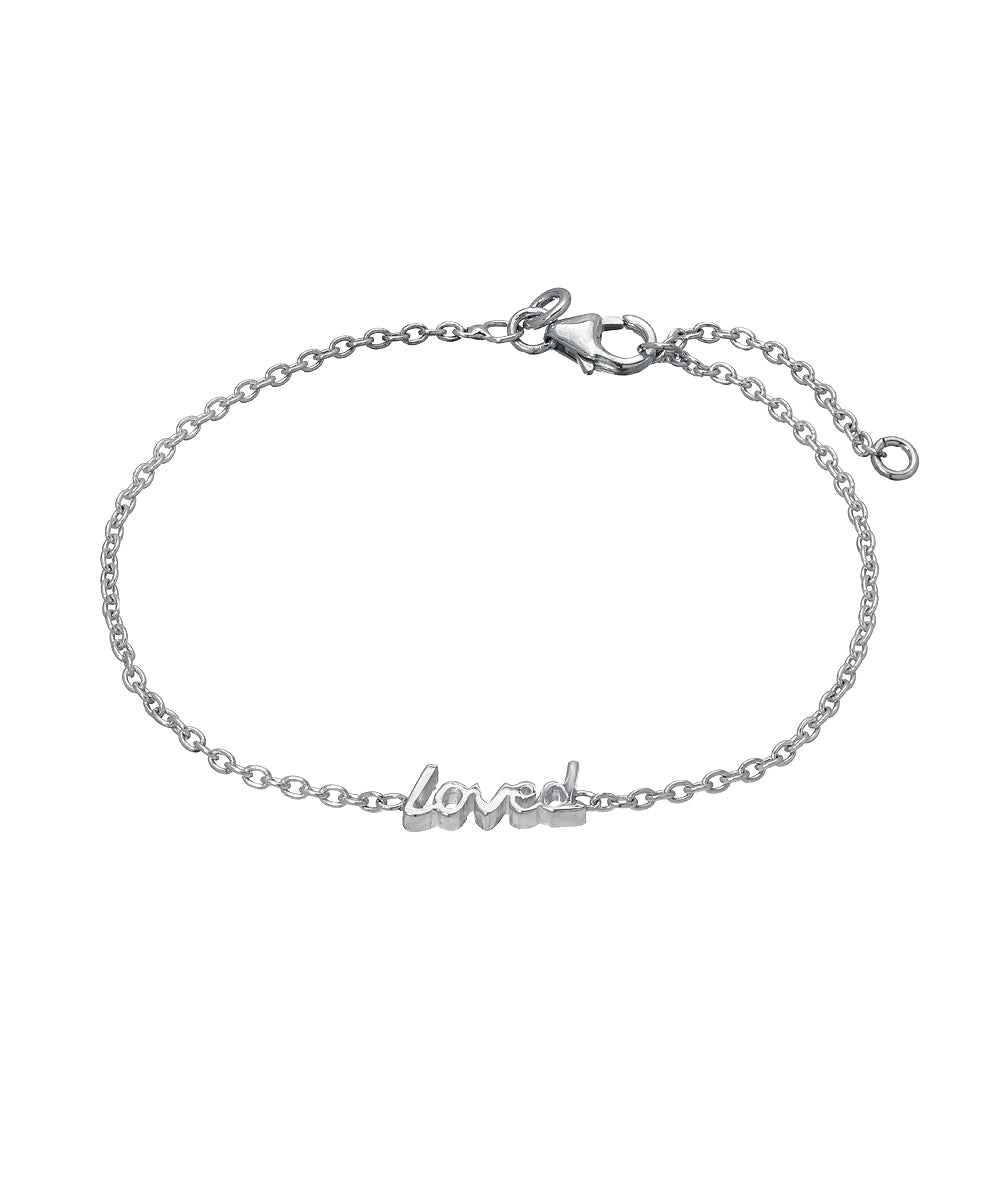The Sterling Silver Chain Wrist and Ankle Name Bracelet features a delicate 925 sterling silver chain, a script "loved" charm at the center, a lobster clasp closure, and adjustable length.