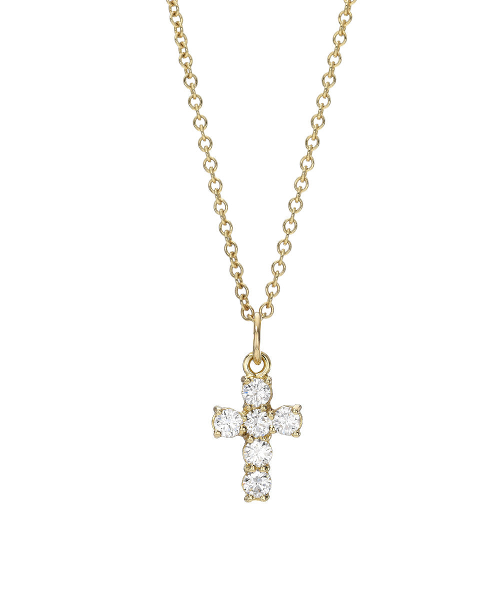 The 14 Karat Six Stone 0.66 Carat Total Weight Lab Diamond Cross Pendant Necklace features a delicate cross adorned with six sparkling lab-grown diamonds.