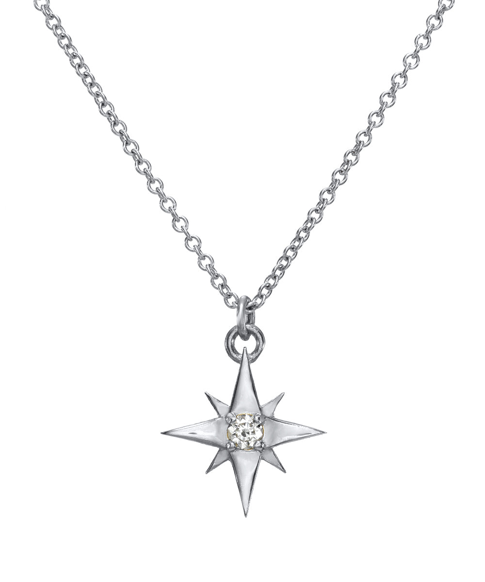 The 14K Gold Lucky North Star Diamond Pendant Necklace features an eight-point star-shaped pendant with a central diamond, displayed on a simple chain against a white background.