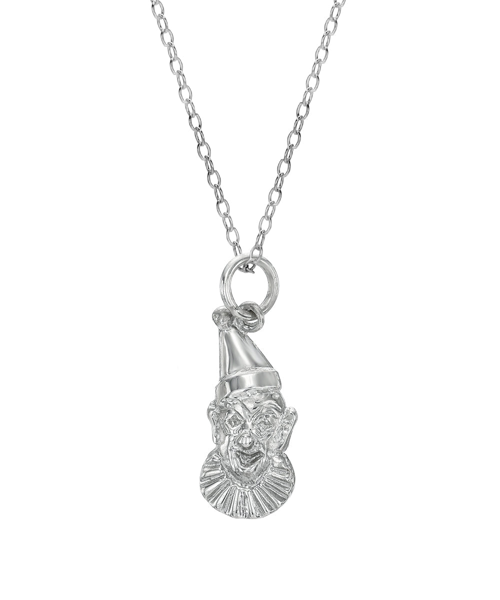 The Sterling Silver Clown Face Circus Pendant Necklace, 18", showcases a whimsical clown head with a pointed hat and ruffled collar, elegantly suspended from a delicate chain against a white background.