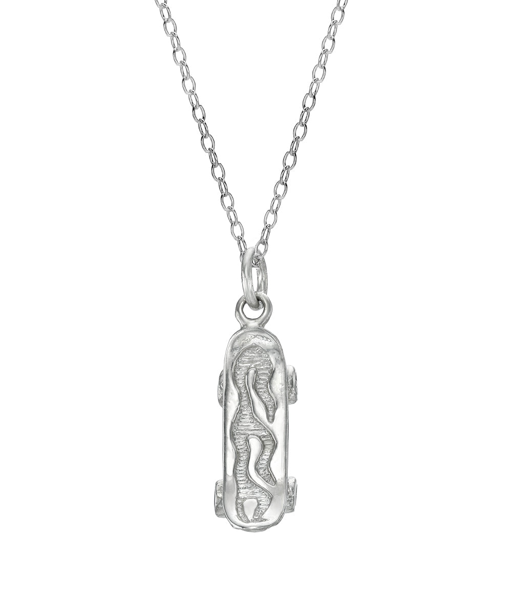 The Sterling Silver Flaming Skateboard Pendant Necklace features a mini skateboard-shaped pendant with a raised flame design on a delicate chain.