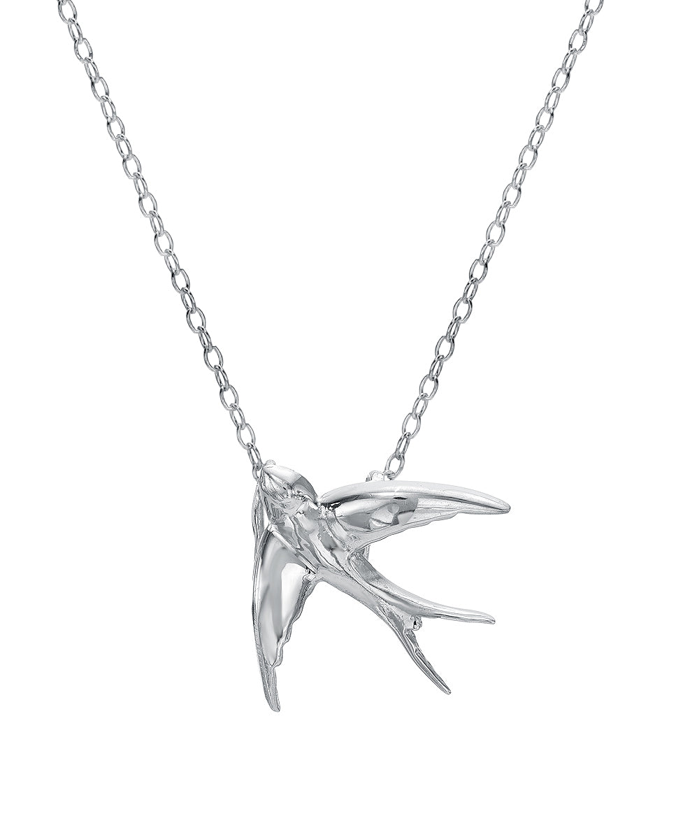 The Sterling Silver Swallow Pendant Necklace features a finely crafted swallow design in 925 sterling silver, suspended from a delicate chain.