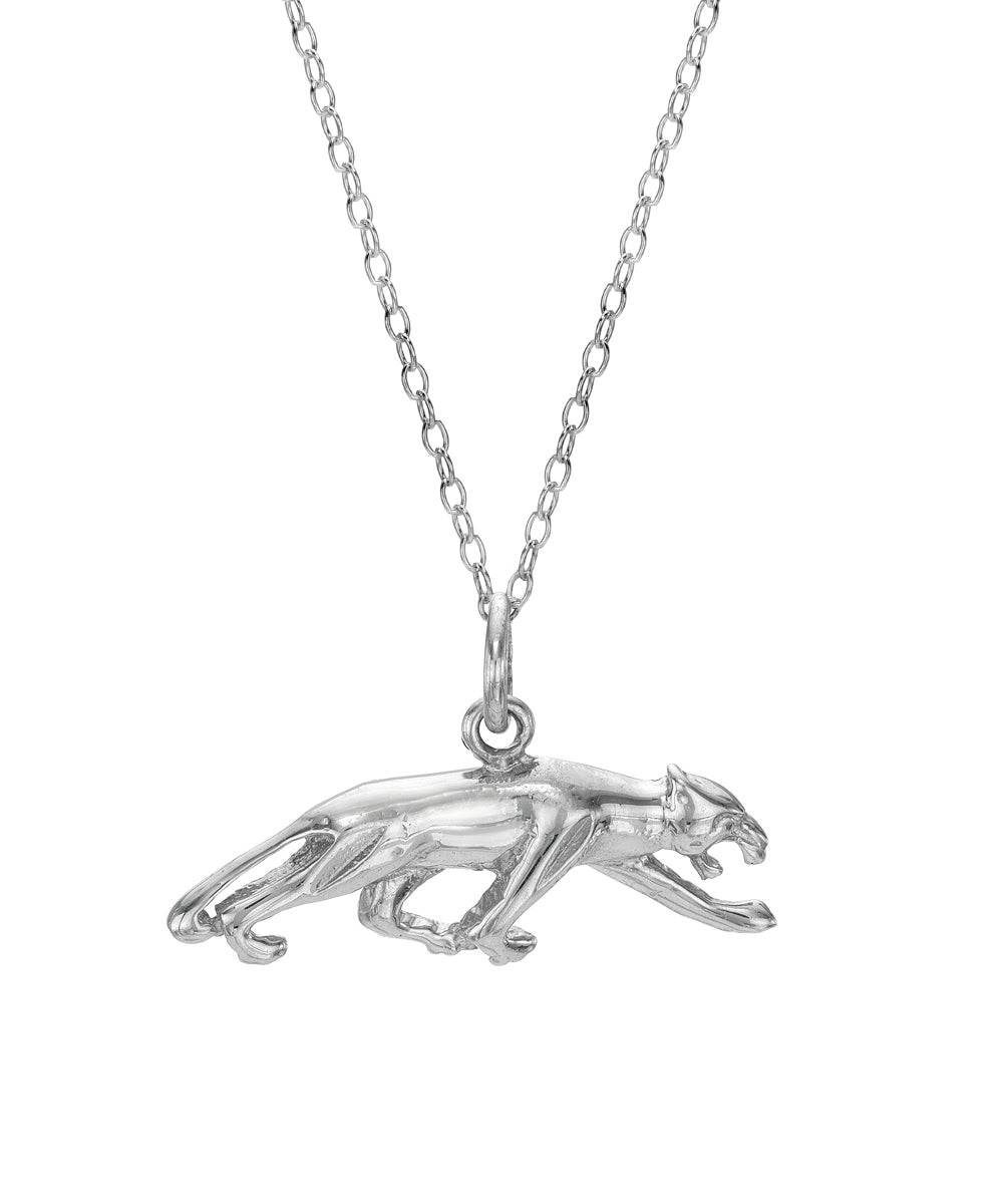 The Sterling Silver Jaguar Pendant Necklace showcases a prowling jaguar on a fine chain, set against a white background—a bold statement piece of animal-inspired jewelry.