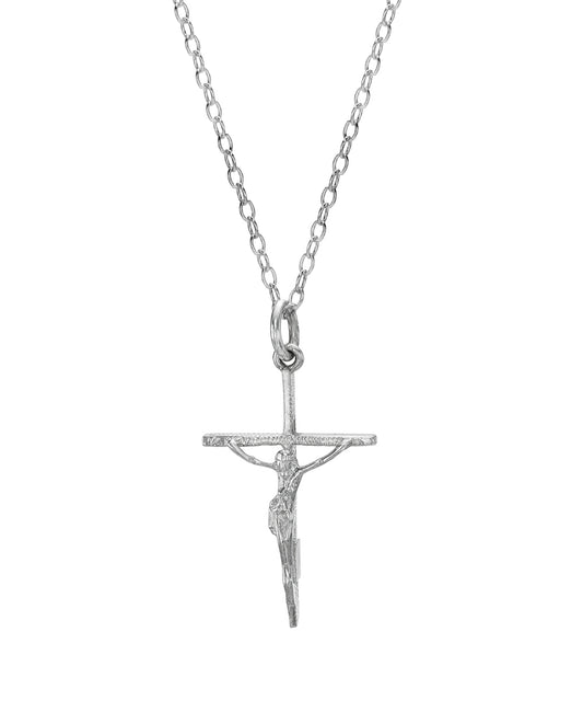 The Sterling Silver Crucifix Cross Pendant Necklace showcases Jesus Christ on the cross, elegantly displayed on a silver chain against a plain white background—a timeless piece of religious jewelry.