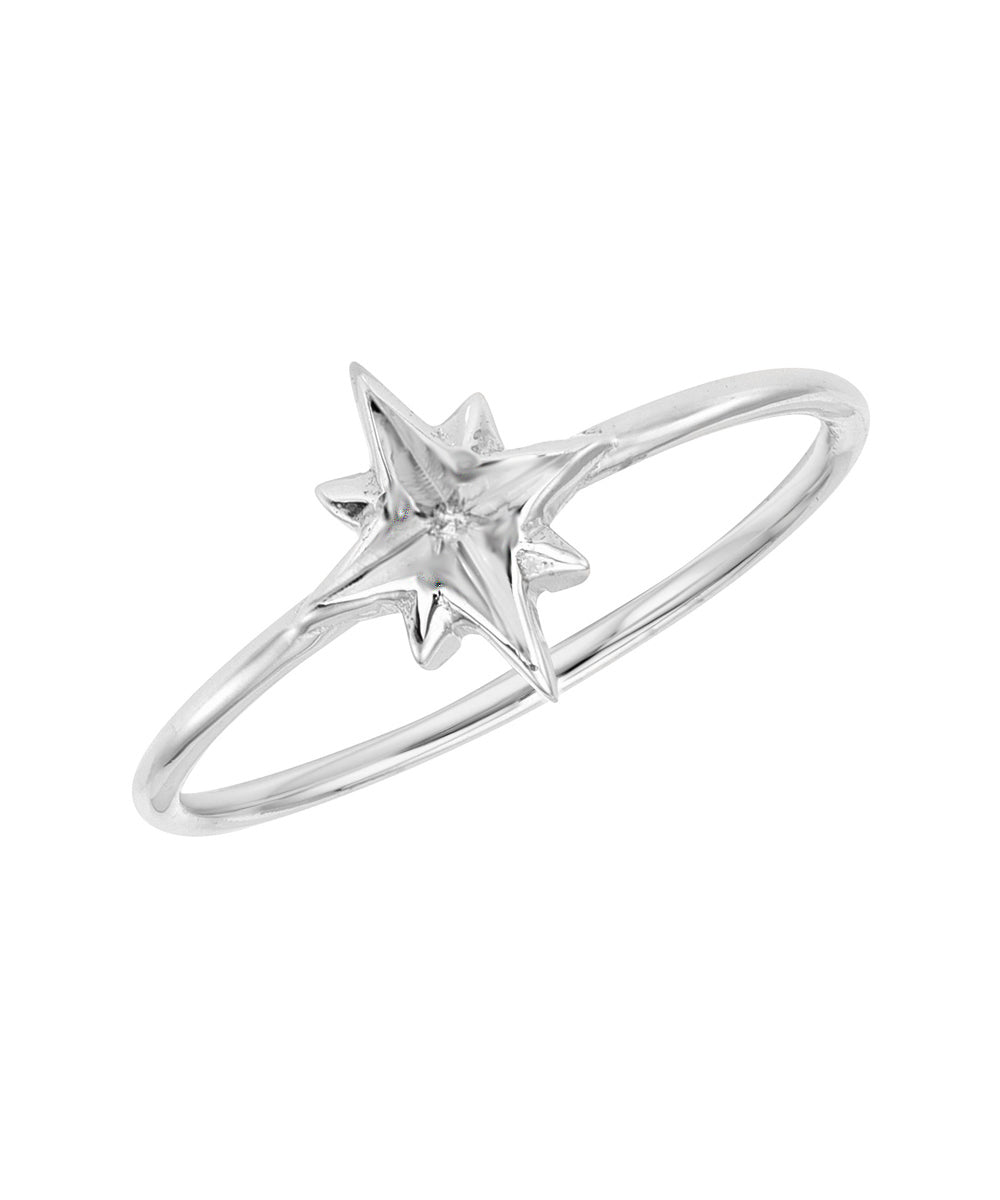 A dainty 14KT gold ring with a raised North Star design on a slim band—ideal for anyone seeking an elegant, minimalist North Star ring.