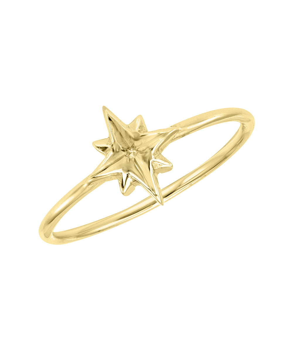 The 14KT Gold North Star Ring features a delicate, minimalist thin band with a raised eight-pointed North Star at its center.