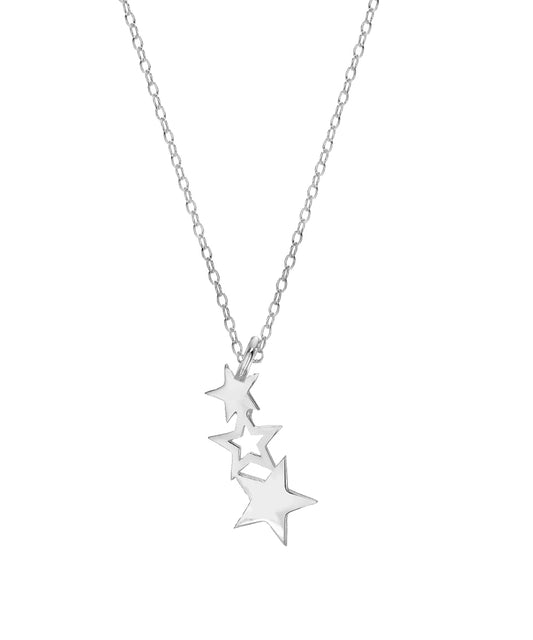 The Sterling Silver North Star Pendant Necklace features three star-shaped pendants of different sizes clustered on a delicate chain, creating a celestial jewelry piece that shines beautifully against a white background.