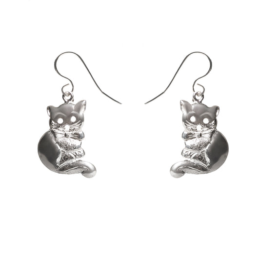 The Sterling Silver Cat Drop Earrings feature sitting cat shapes with detailed features and curled tails, displayed against a white background—a charming and whimsical jewelry piece.