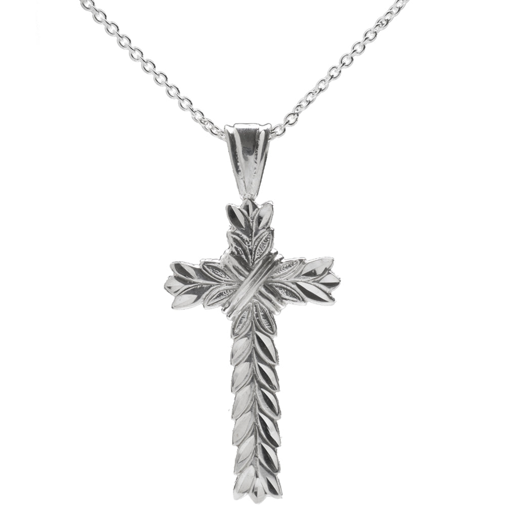 The Sterling Silver Wheat Cross Pendant Necklace features a cross-shaped pendant with detailed leaf engravings, resembling intertwined palms, hanging from an elegant Italian rolo chain.