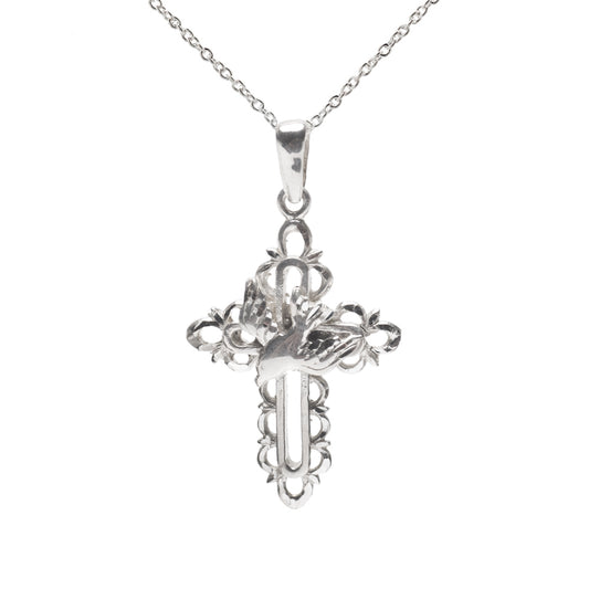 The Sterling Silver Dove Cross Peace Pendant Necklace features intricate loops and a raised praying hands design, making it a beautiful spiritual jewelry piece for any collection.