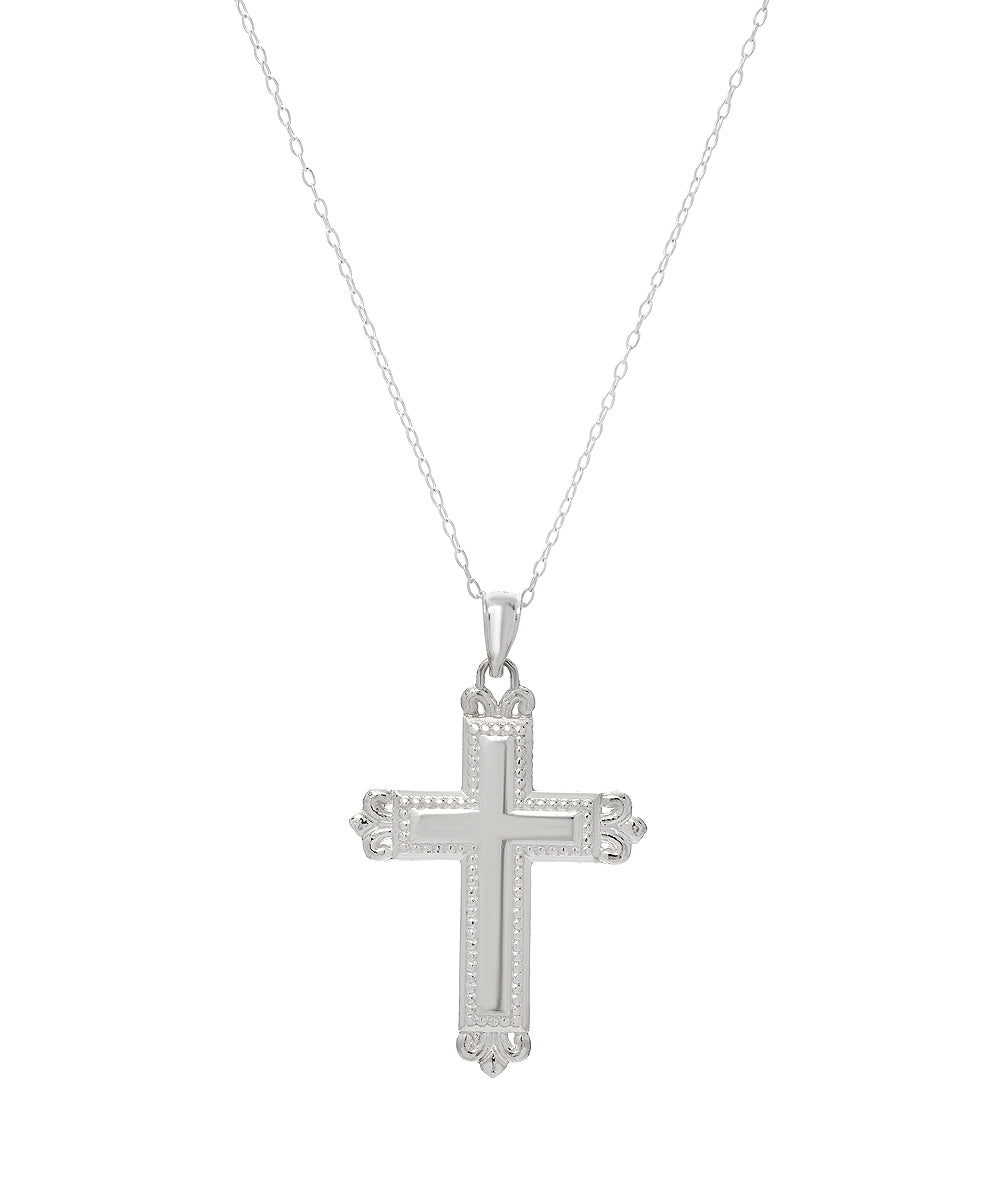 The Sterling Silver Fleur Love Cross Pendant Necklace, featuring ornate and heart-shaped accents, hangs from a delicate chain centered on a plain white background.
