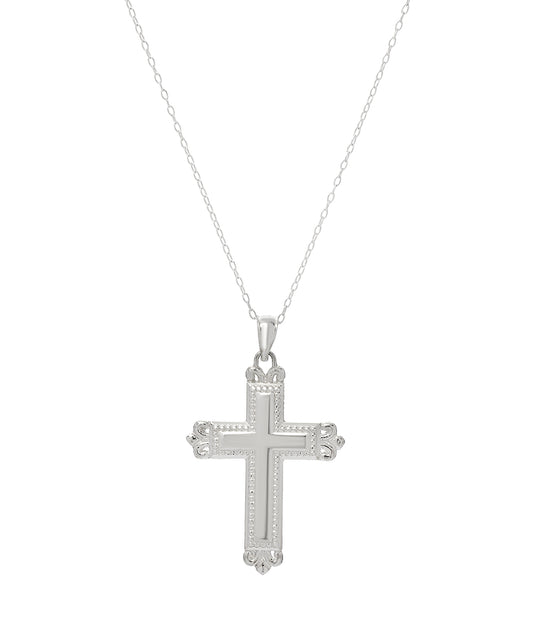 The Sterling Silver Fleur Love Cross Pendant Necklace, featuring ornate and heart-shaped accents, hangs from a delicate chain centered on a plain white background.