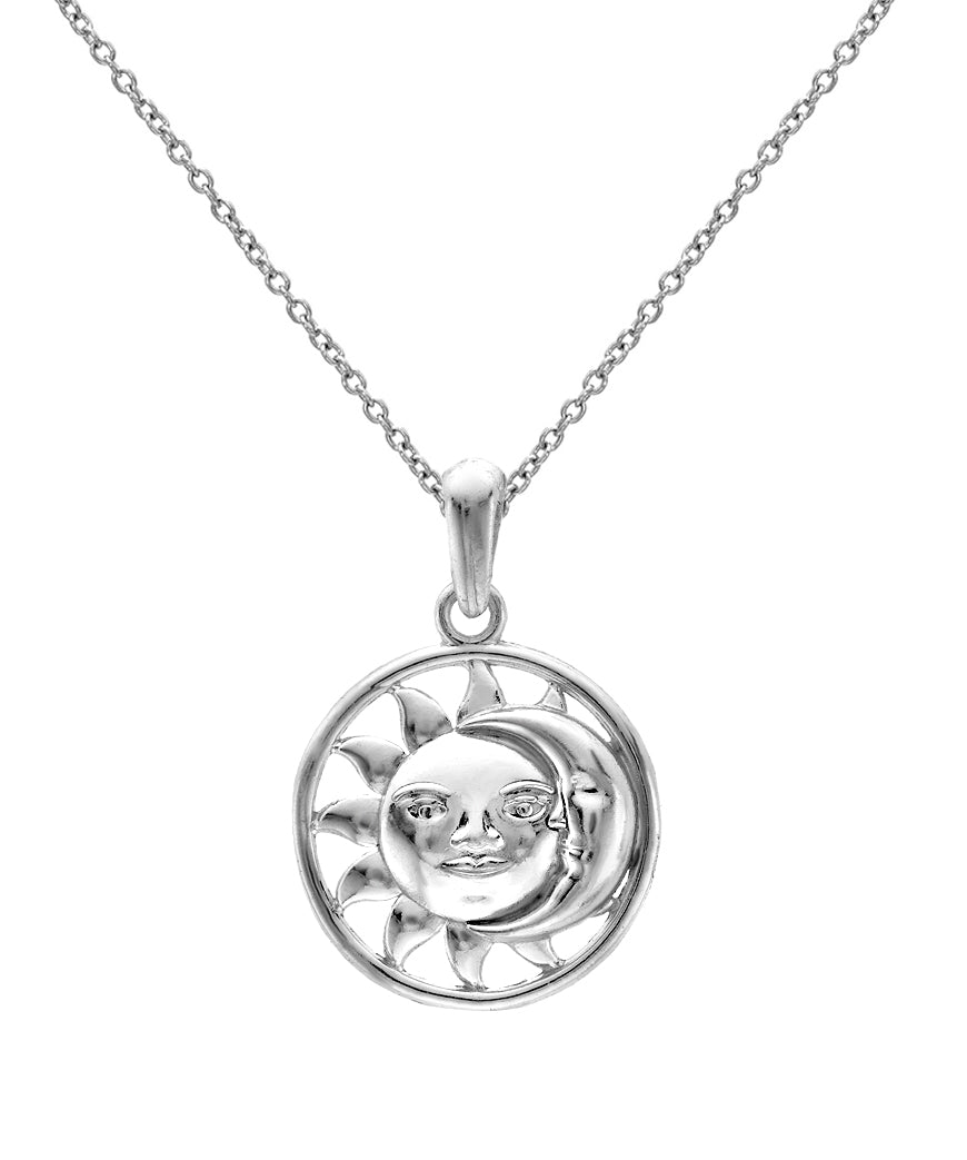 The Sterling Silver Celestial Sun and Crescent Moon Pendant Necklace, 18", features a human-faced sun encircling a crescent moon for an elegant celestial look on a delicate chain.