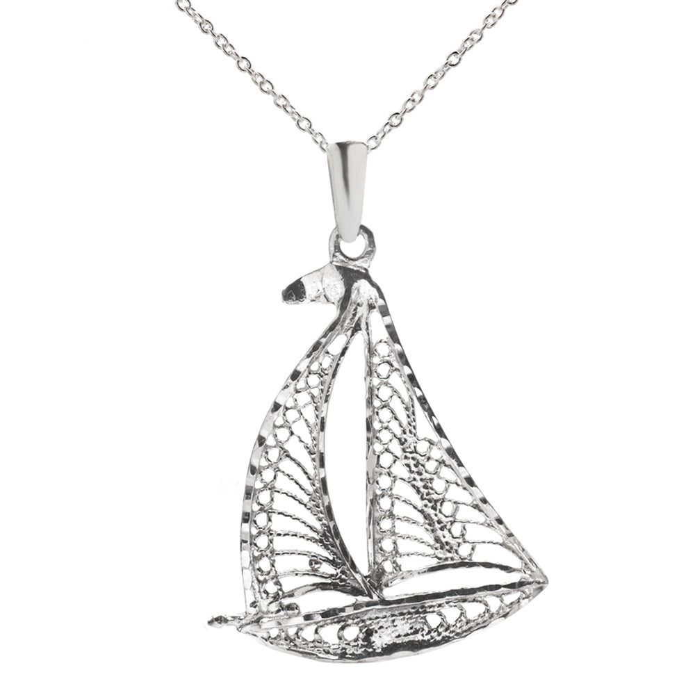 The Sterling Silver Sailboat Pendant Necklace features intricate openwork detailing on the sails and hull, hanging from a fine chain—an ideal nautical accessory for ocean lovers.
