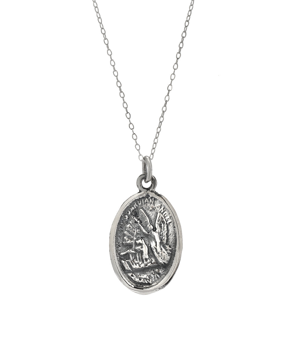 The Sterling Silver Christ Child and Protector Pendant Necklace features a thin chain and an oval pendant engraved with a figure, reminiscent of an ancient coin, inspired by classic religious jewelry.