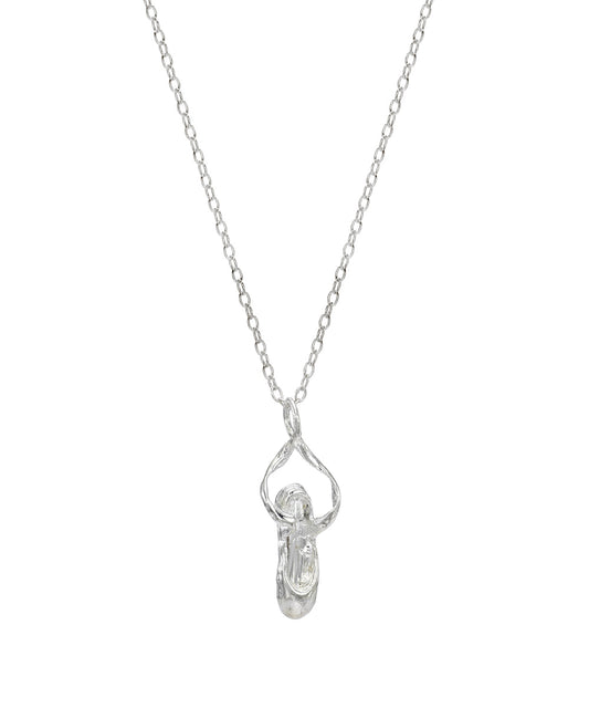A polished sterling silver necklace featuring a minimalist ballet slipper pendant. This elegant piece is a thoughtful gift for dancers.