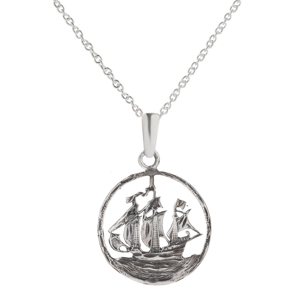 Sterling Silver Pirate Ship Pendant Necklace, 18"—features a round pendant with a detailed cutout of an old sailing ship on water, hanging from a delicate chain.