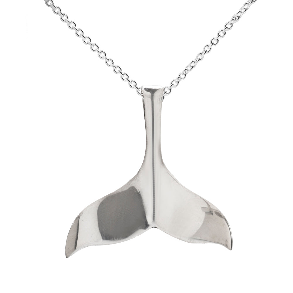 The Sterling Silver Whale Tail Pendant Necklace features a sleek sterling silver pendant on a simple chain, shown against a white background—an ideal piece of ocean-inspired jewelry.