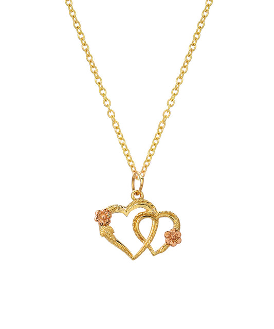 The 14 Karat Yellow and Rose Gold Double Heart Rose Pendant Necklace features two intertwined hearts and delicate rose gold flower accents on each side.