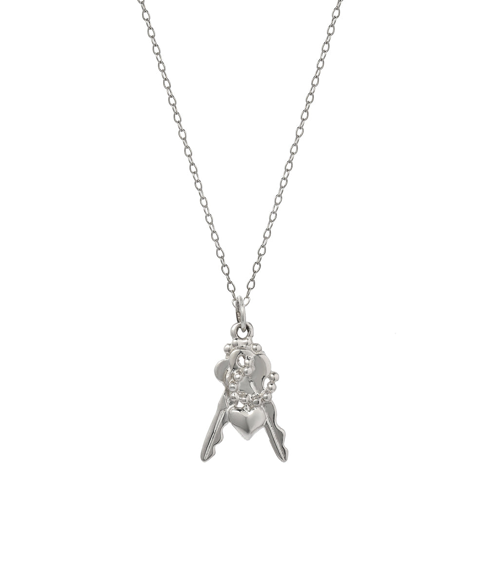 The Sterling Silver Keys To My Heart Pendant Necklace, 16", showcases two small key charms, a beaded ring, and a heart pendant grouped together on a delicate chain.