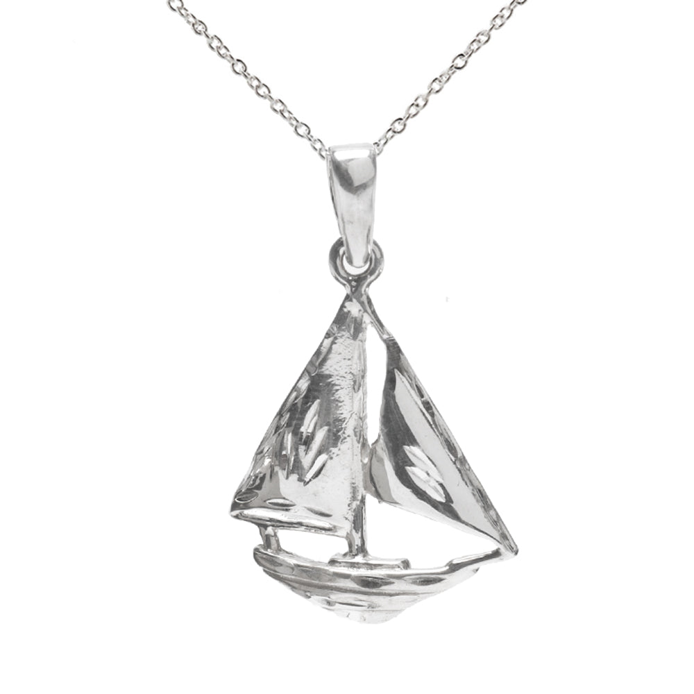 The Sterling Silver Wooden Sailboat Pendant Necklace features a detailed two-sail boat design on a delicate chain—an elegant nautical accessory ideal for ocean lovers and sailing enthusiasts.