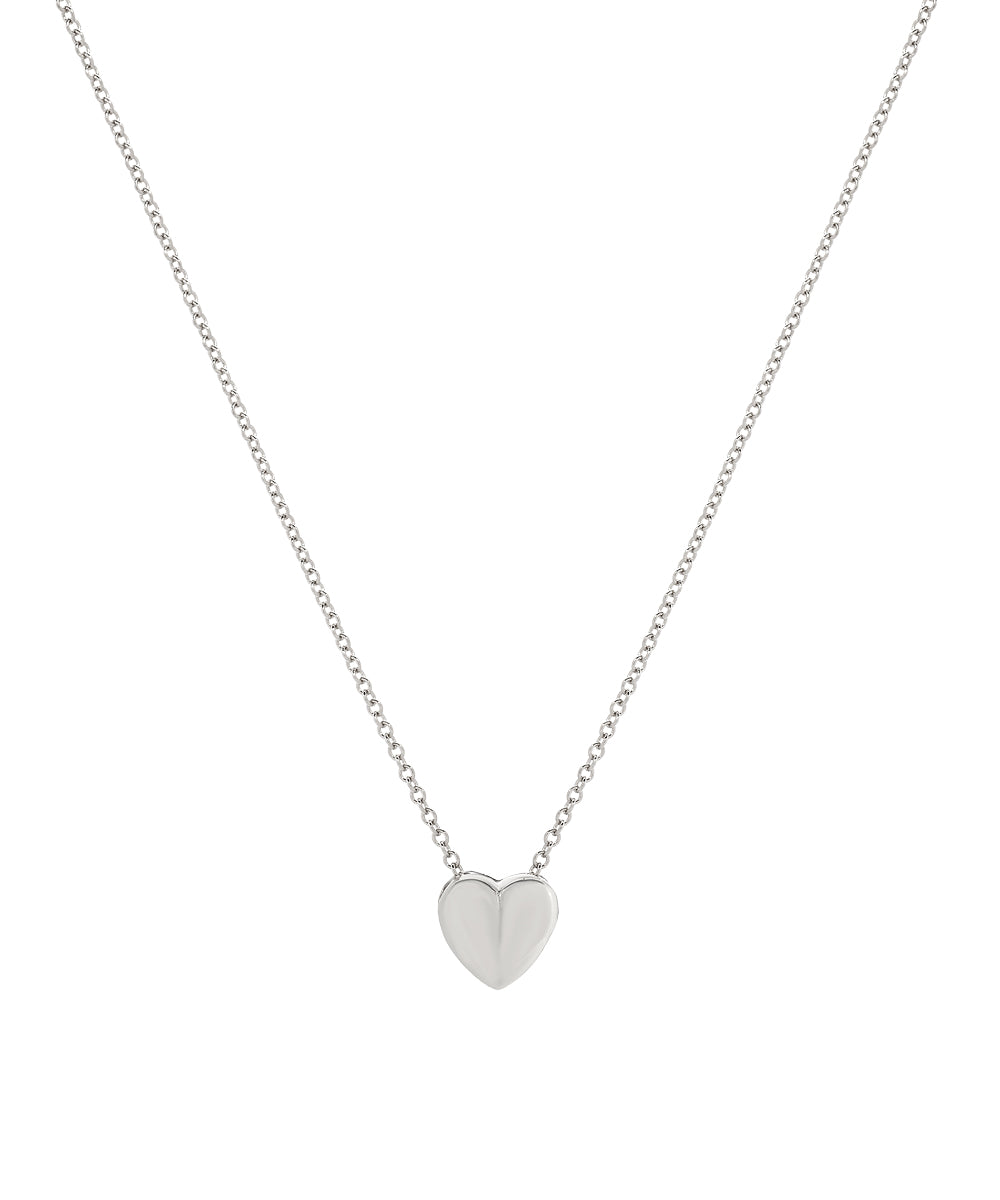 The 14 Karat Gold Sliding Heart Necklace features a small, smooth heart pendant centered on a delicate gold chain. Its minimalist design stands out elegantly against a plain white background.