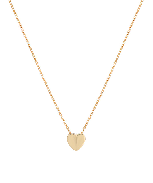The 14 Karat Gold Sliding Heart Necklace features a small polished heart pendant centered on a delicate gold chain, shown against a plain white background.