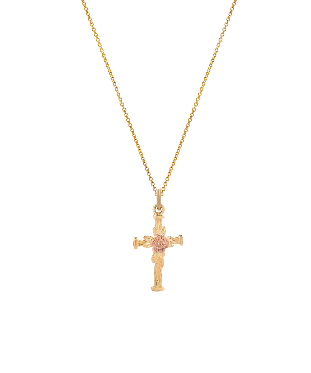 The 14 Karat Gold Two Tone Flower Cross Pendant Necklace, 18", features an elegant cross accented with a flower detail—ideal for those seeking stylish, spiritual jewelry.