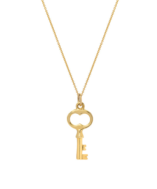 The 14 Karat Graduation Gold Key Pendant Necklace features a delicate Italian rolo chain and a vintage-inspired key pendant with a heart-shaped bow at the top.