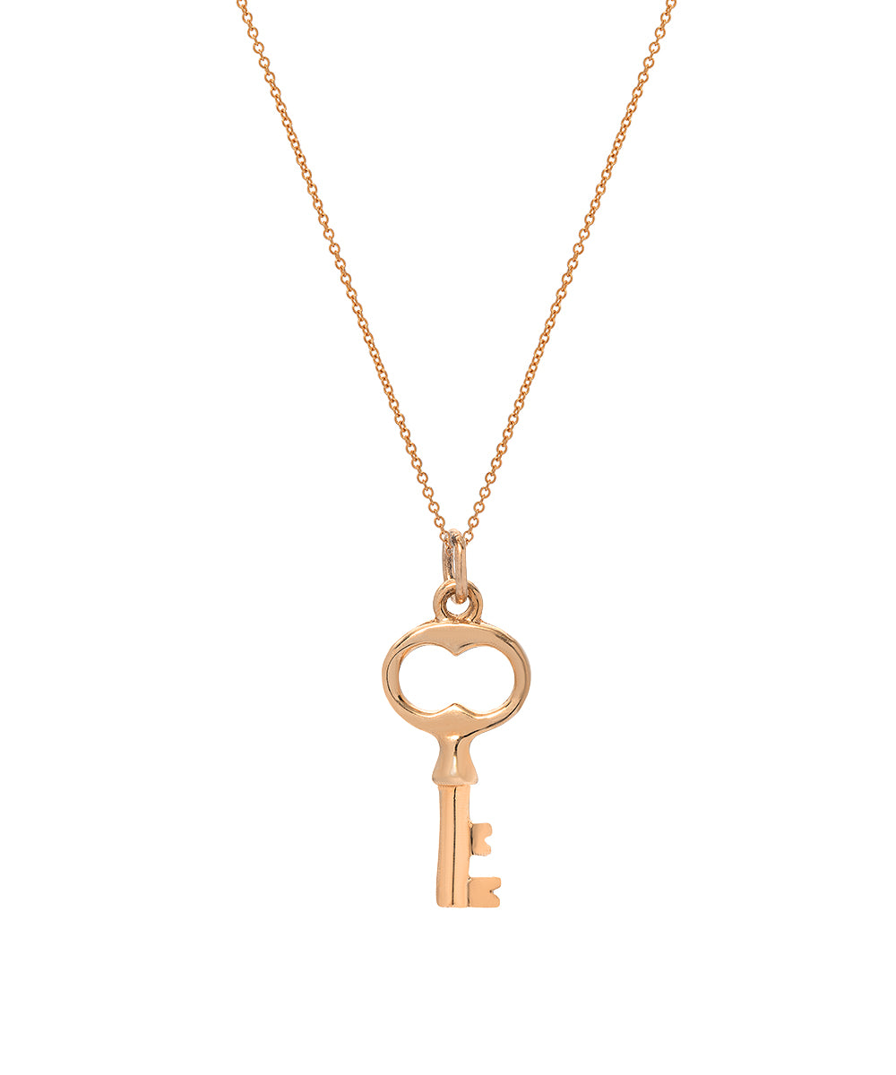 The 14 Karat Graduation Gold Key Pendant Necklace features a delicate Italian rolo chain and a vintage-style gold key with a heart-shaped bow, displayed centrally against a plain white background.