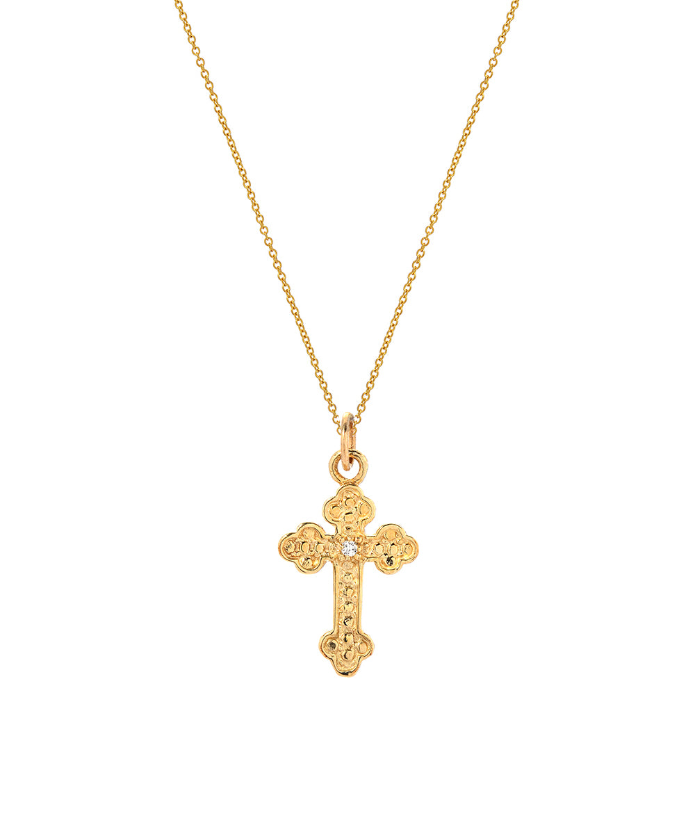 The 14KT Gold Diamond Cross Fleury Pendant Necklace features a delicate chain and a 0.005 CT diamond accent for added elegance.