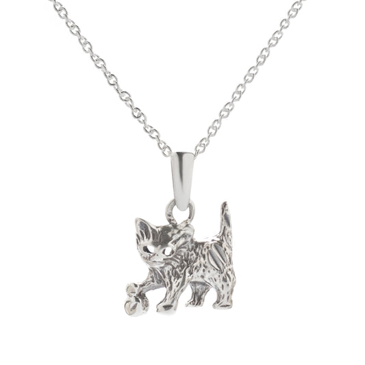The Sterling Silver Cat Pendant Necklace features a detailed cat with a raised tail, one paw forward, and a tiny flower on a delicate chain—perfect jewelry for any cat lover.