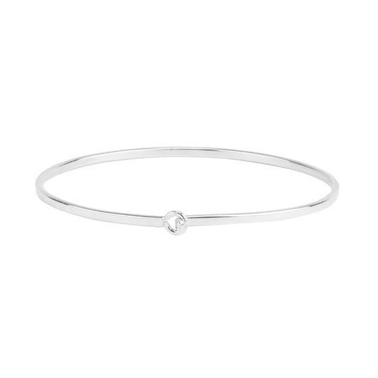The Sterling Silver Flat Wire Latch Bracelet features a minimalist flat wire design with a subtle center knot, presented elegantly against a white background.