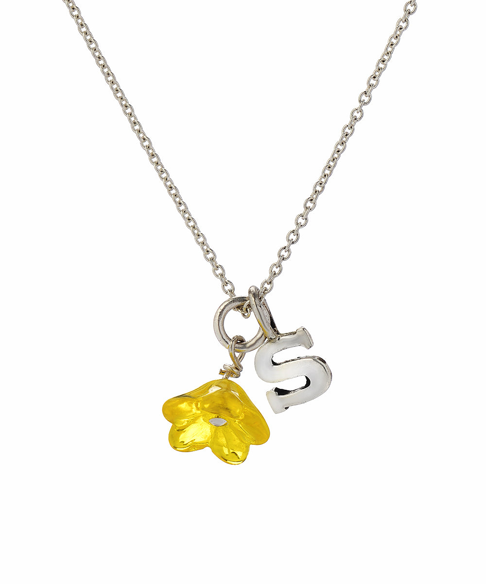 The Sterling Silver Initial and Glass Flower Pendant Necklace features a shiny sterling silver letter S and a delicate yellow glass flower charm, both elegantly suspended from the chain.