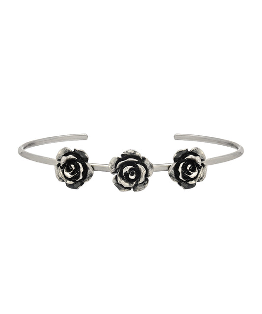 The Sterling Silver Rose Cuff features three detailed rose motifs spaced along an open band, creating an elegant floral bracelet perfect for any occasion.