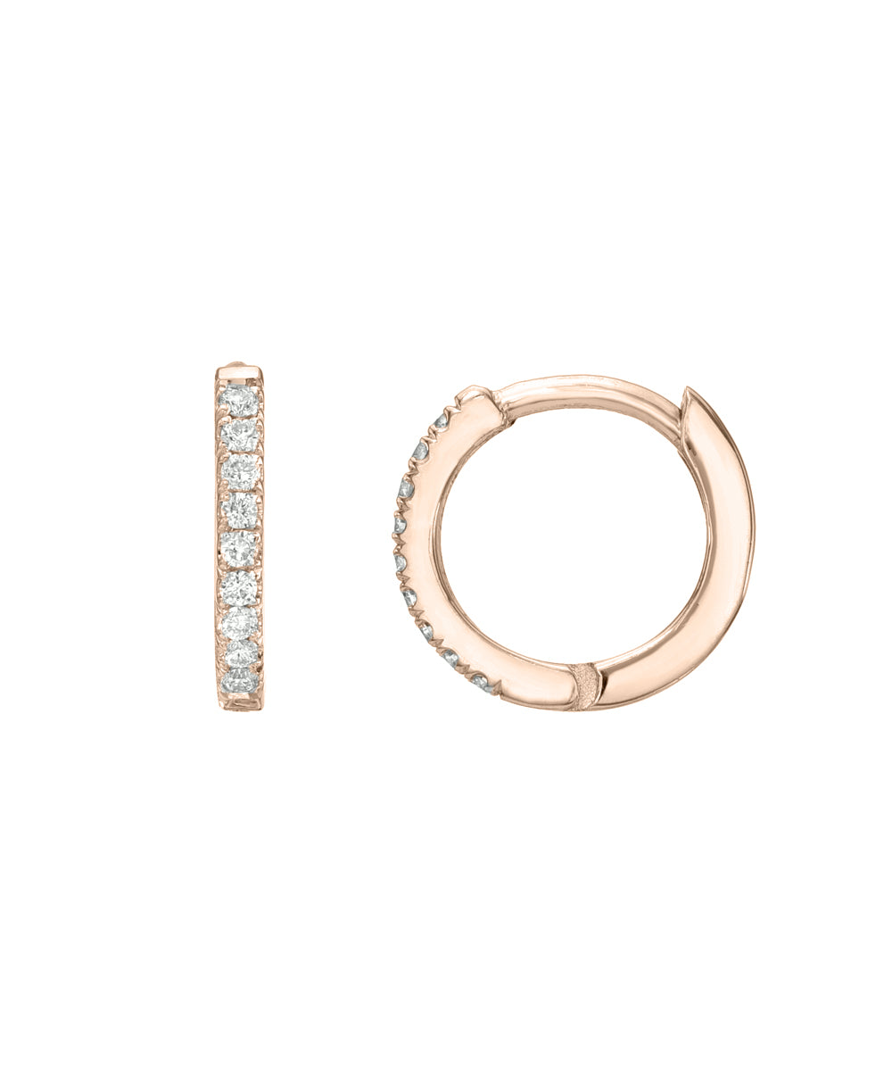 The 14 Karat Yellow Gold Diamond Pave Huggie Hoops feature clear round diamonds in a classic pavé setting, shown from both the front and side for a timeless, elegant look.