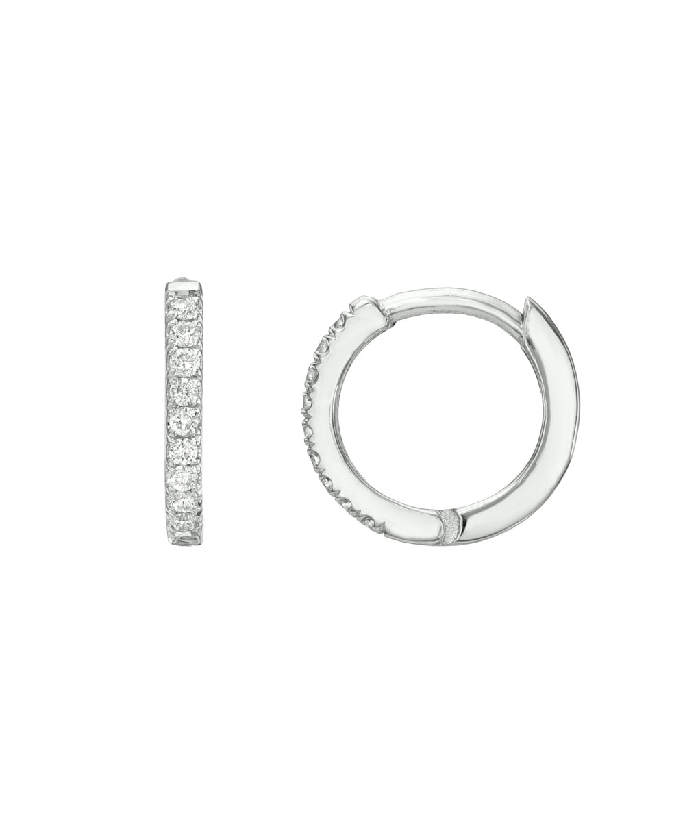 The 14 Karat Yellow Gold Diamond Pave Huggie Hoops feature small, circular earrings with VS1 clarity diamonds set in pavé style—one shown from the side displaying a diamond row, the other from the front showcasing its smooth finish.
